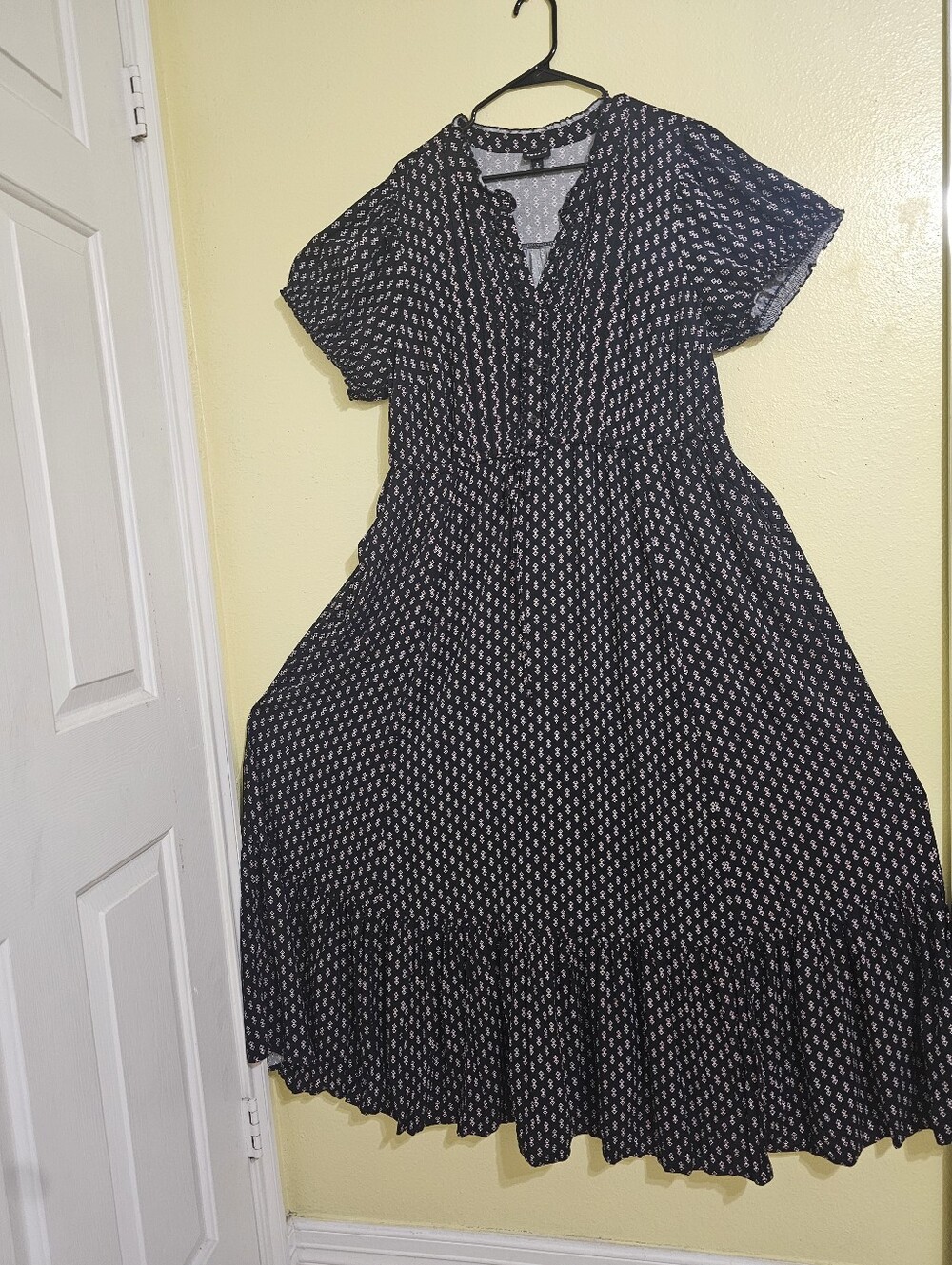 Black Printed Maxi Dress with V-Neck and Ruffle Hem